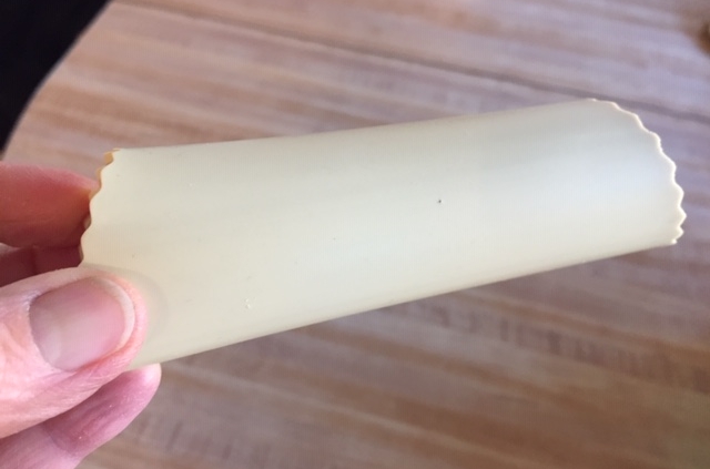 A garlic peeler is a cheap time-saving kitchen tool.
